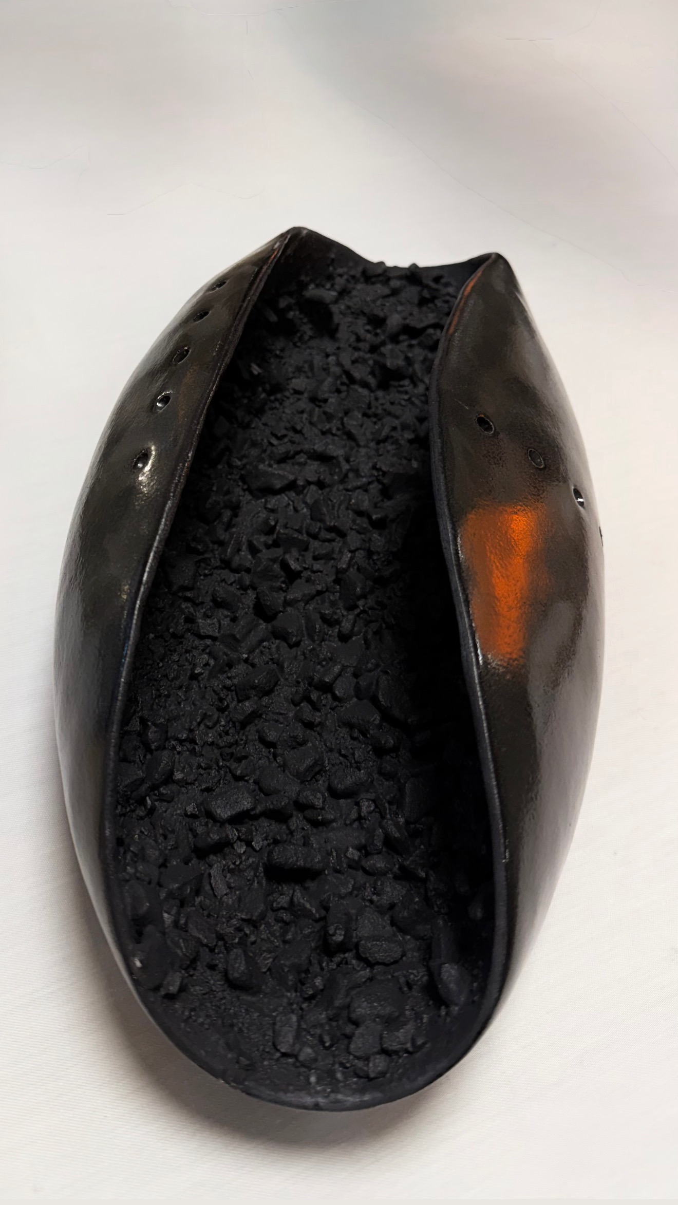 Split Seed, 2025, stoneware, by Ayse Akdemir